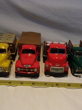 LOT OF FIRST GEAR TRUCKS-1952 GMC-1955 DIAMOND T-1951 FOD-1953 FORD PICKUP 1/34
